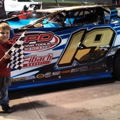 Penny Lehner's grandson, Cullin, in the pits at the Adams County Speedway in Corning, Iowa, on Saturday, June 29.